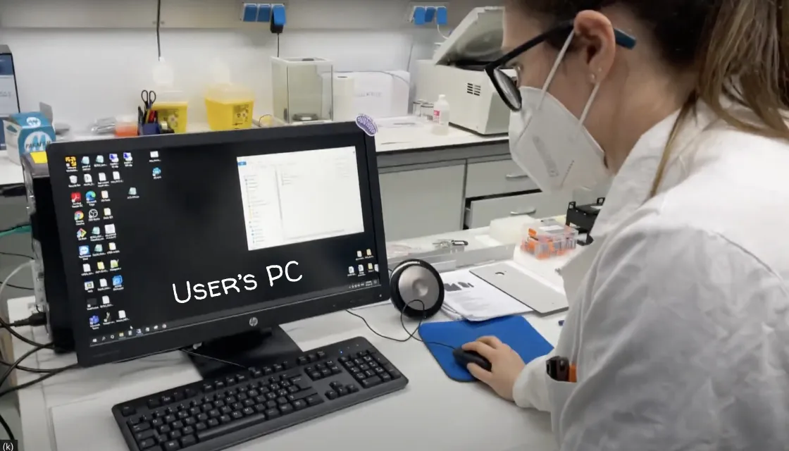 A biologist working on her PC